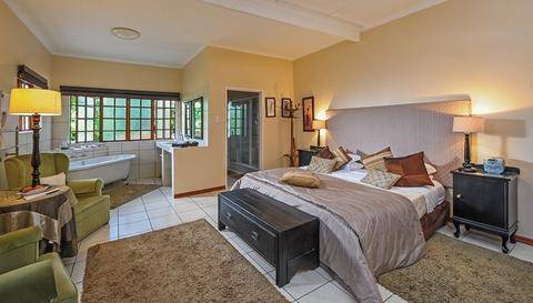 A large de lux suite at Cosmos Cuisine Guesthouse in Addo, Eastern Cape